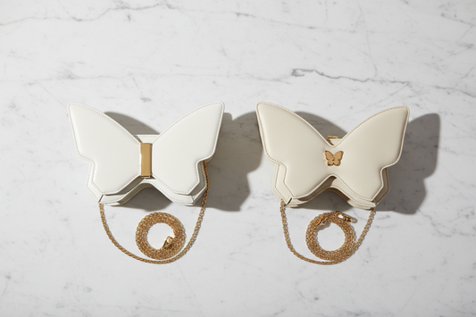Comparing the Carlos Falchi White Top Grain Mini Butterfly to Lambskin Versions: A Guide to Material, Craftsmanship, and Timeless Elegance