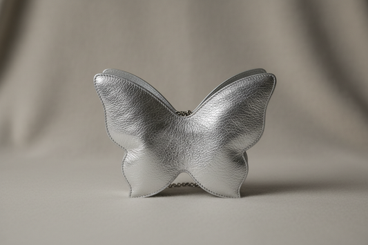 What Makes the Carlos Falchi Silver Crinkle Lambskin Mini Butterfly a Unique Statement of Timeless Elegance and Artisanal Craftsmanship