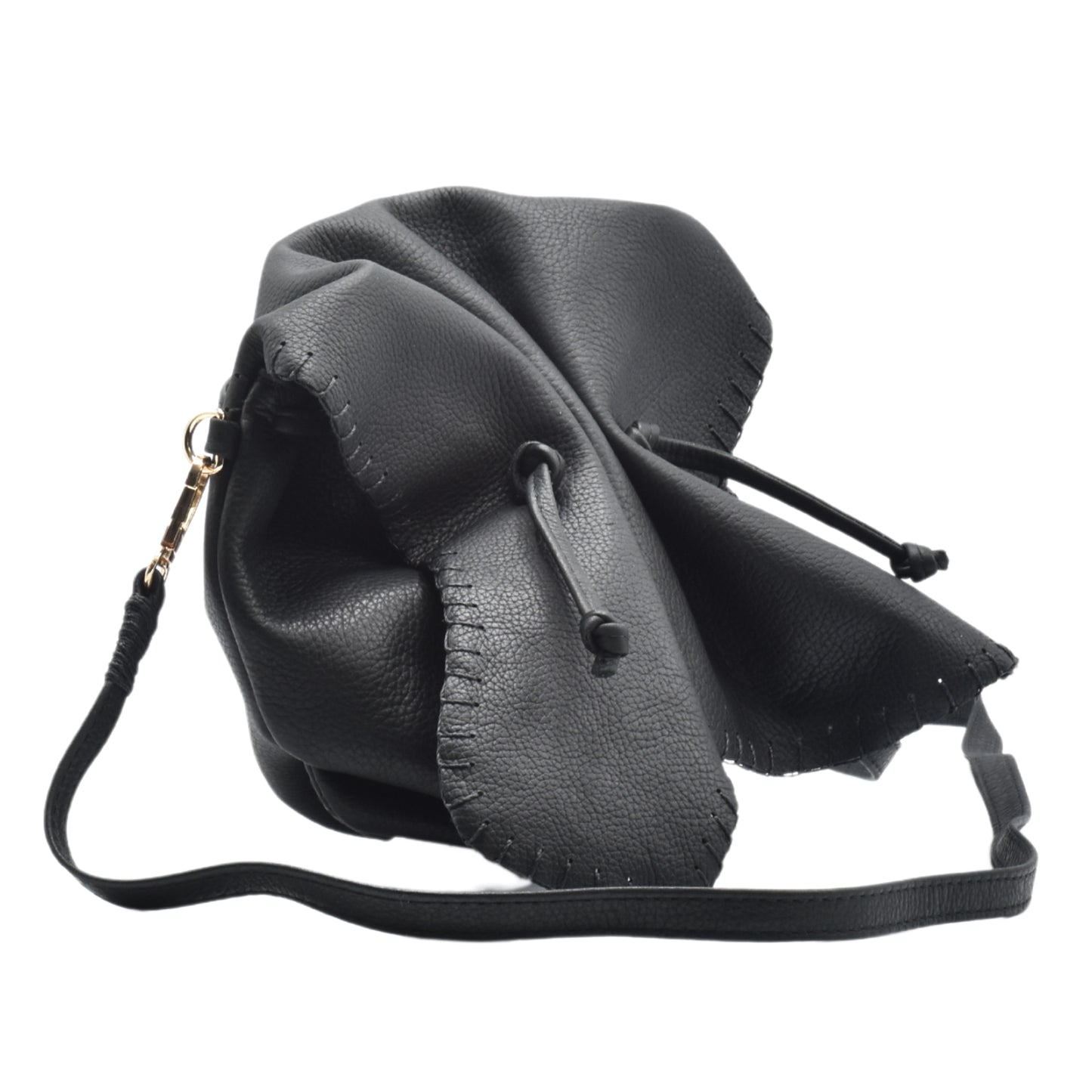 Close-up of the Butterfly Bag’s textured leather surface with vibrant magenta and purple hues, highlighting intricate