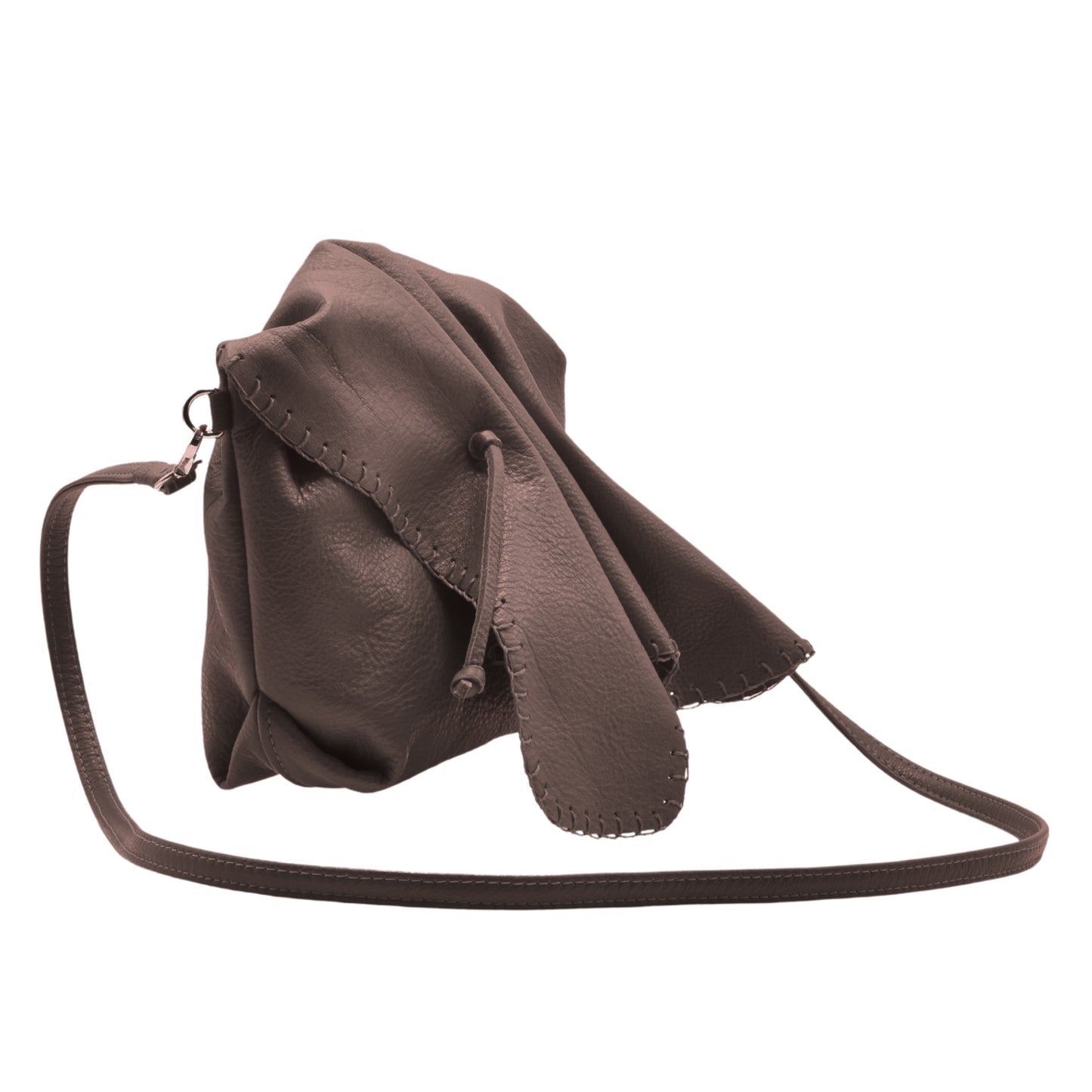 Close-up of the Butterfly Bag’s vibrant yellow leather surface with intricate embossed butterfly patterns and textured