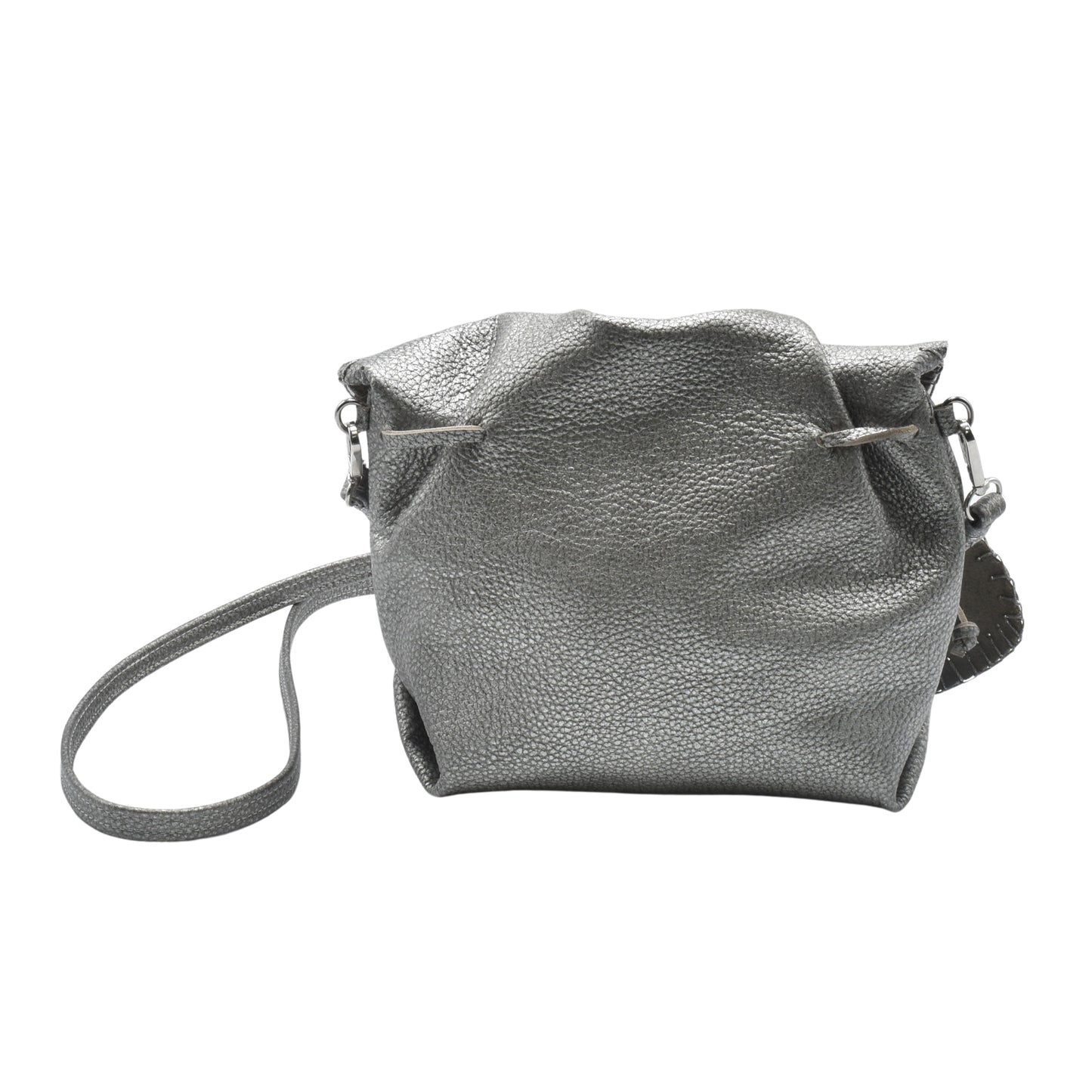 Close-up of textured purple butterfly-shaped bag with stitched edges and small gold zipper pull detail.