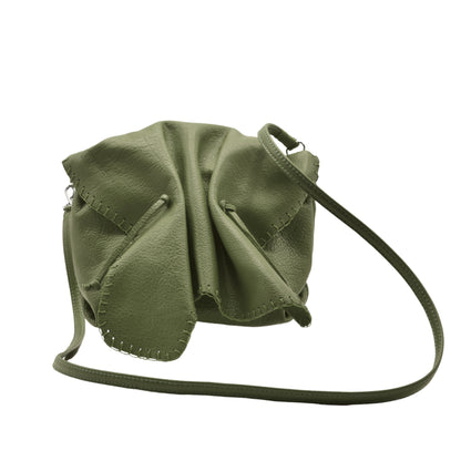 Close-up of the Butterfly Bag’s textured leather surface with intricate stitching and a glimpse of the gold-toned zipper