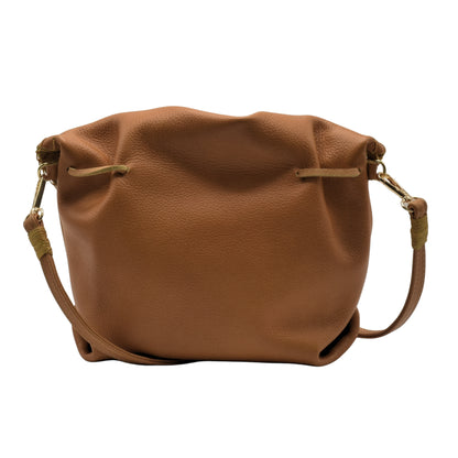 Close-up of the Butterfly Bag’s textured leather surface and gold-toned zipper pull detail from an angled front view.