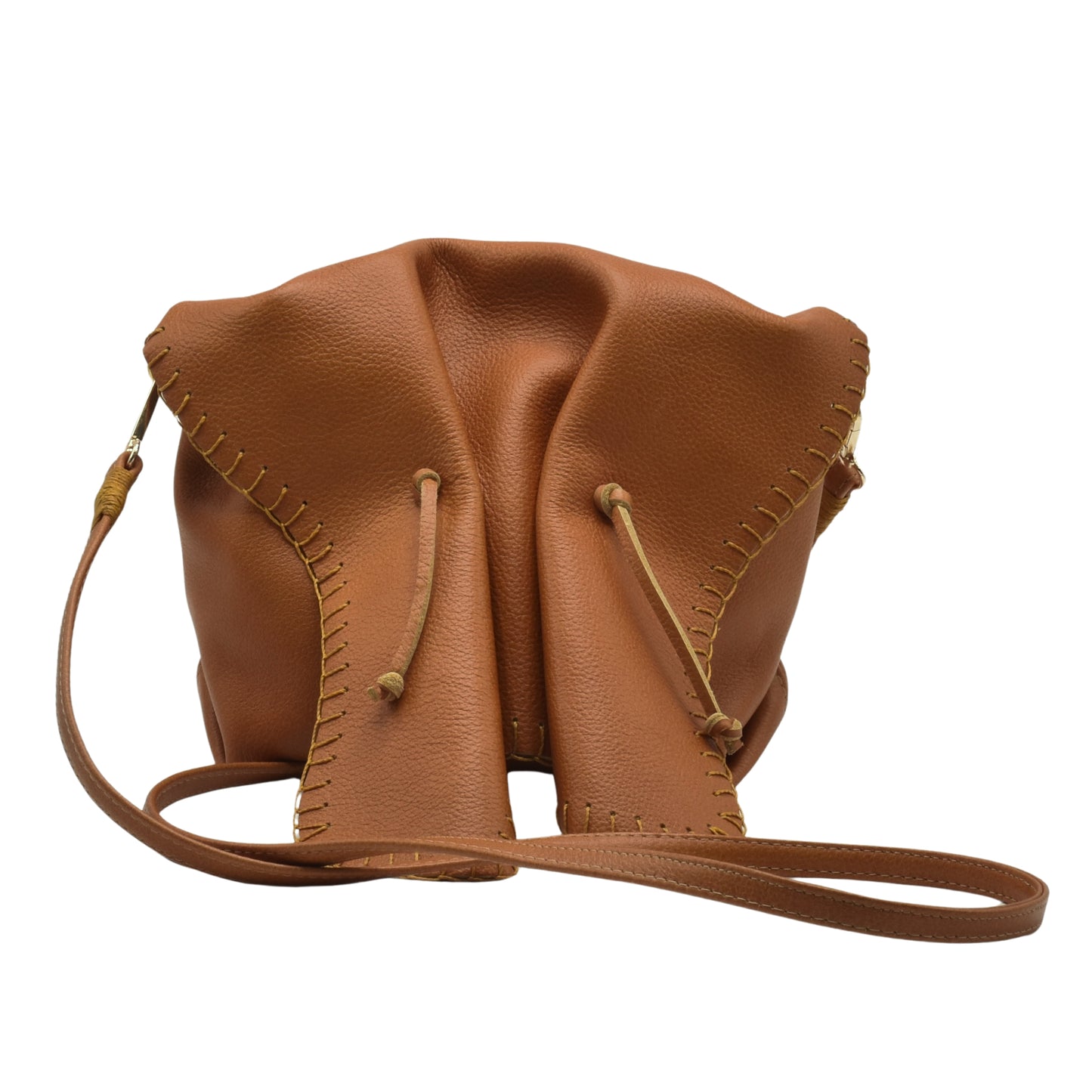 Close-up of the Butterfly Bag’s textured faux leather surface with a focus on the embossed floral pattern and stitching