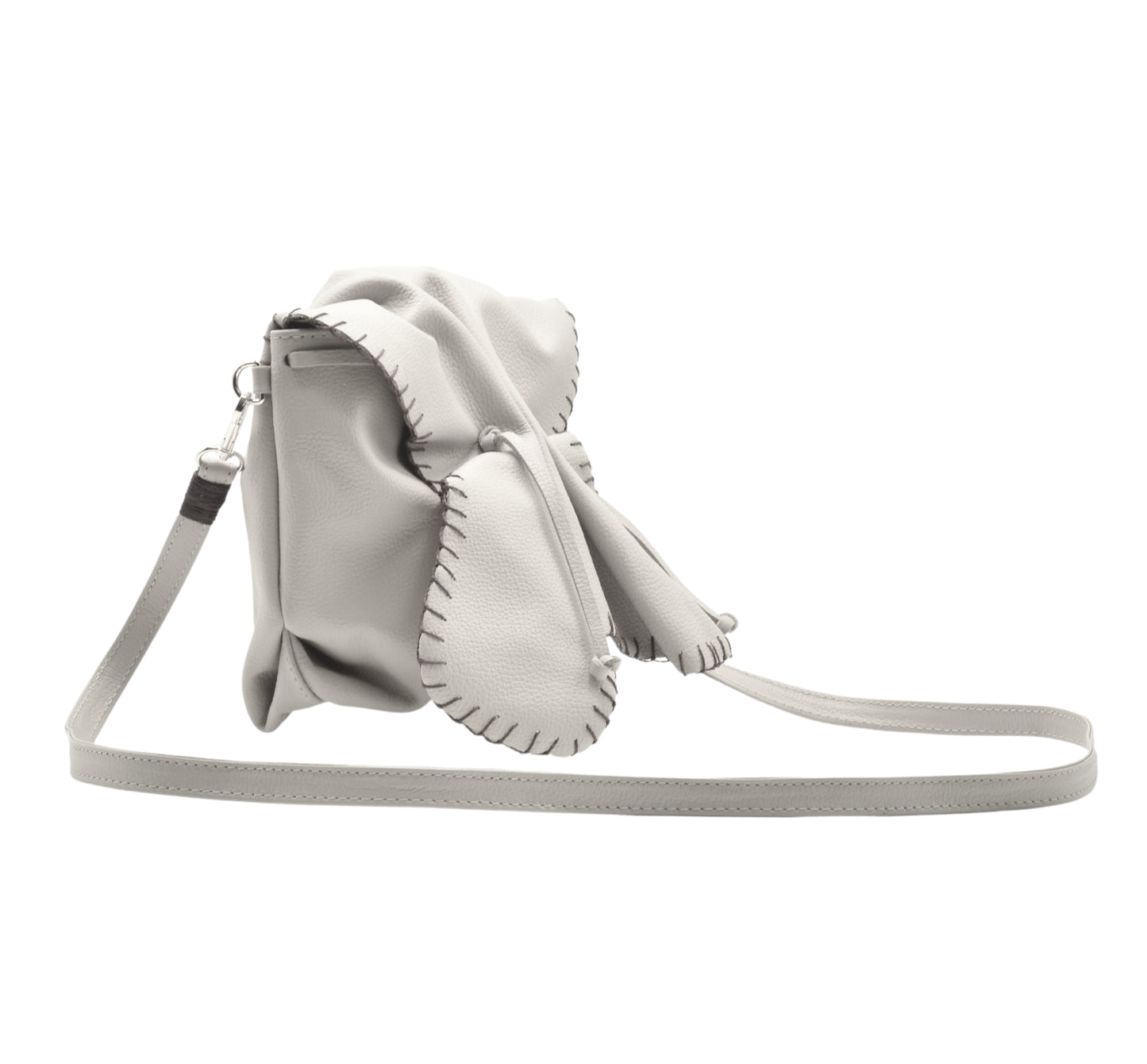 Close-up of the Butterfly Bag’s vibrant turquoise leather strap with textured stitching detail and silver hardware accents.