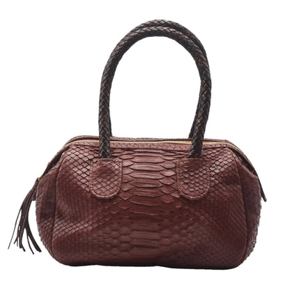 Close-up of the rich, textured Python mini barrel's dark brown natural leather surface with visible grain and subtle tooling