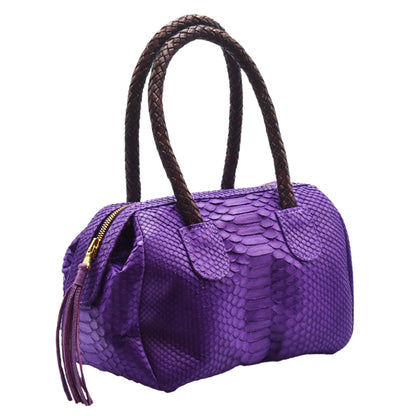 Close-up of the textured, honey-brown python mini barrel leather with subtle scale pattern and natural sheen detail