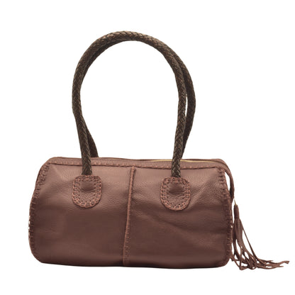 Close-up of the textured wooden surface and carved leather handle detailing on the Classic Barrel from a slightly angled top