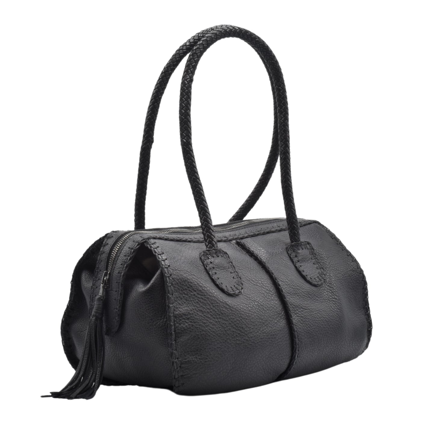 Close-up of the textured, matte wood surface with visible grain and subtle carvings on the barrel's side.