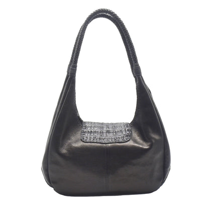 Close-up of textured caramel-colored woven fabric handle with brass rivet attachment detail on Croc Hobo bag