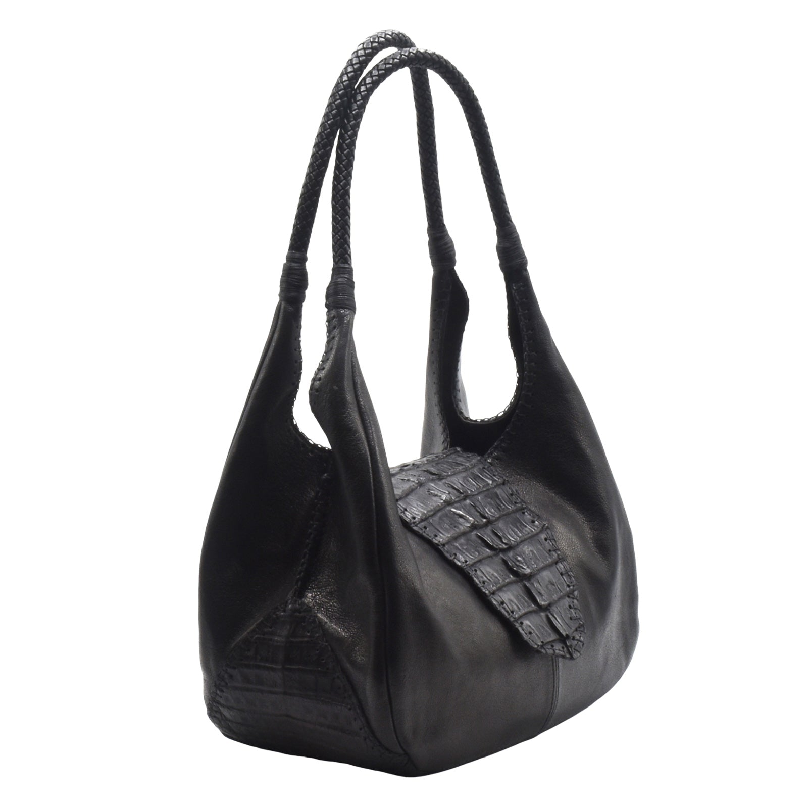 Close-up of the Croc Hobo’s textured woven straw material with leather strap detailing and silver buckle accents.