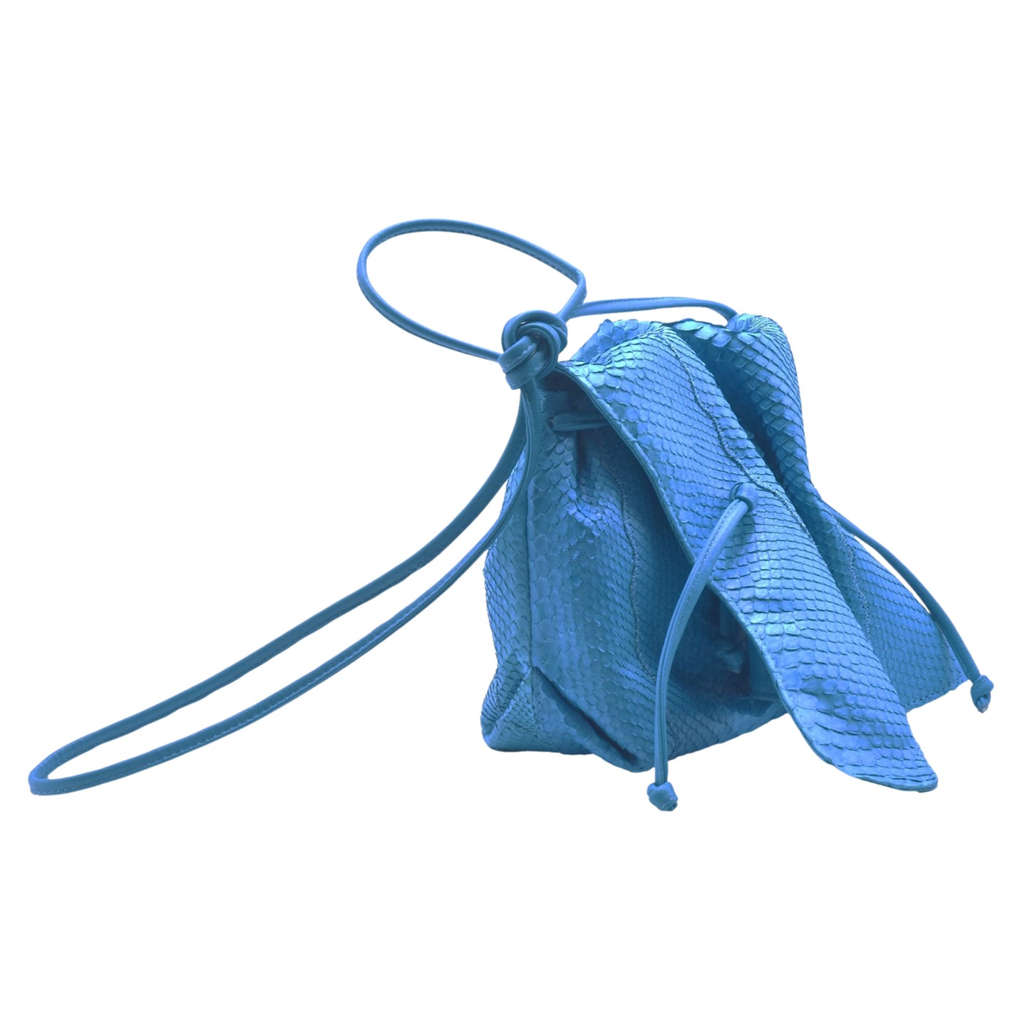 Close-up of the Python Butterfly Bag’s textured leather surface showcasing intricate scale patterns and rich amber hue