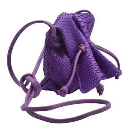 Close-up of the genuine python skin texture on the mini butterfly bag's front flap, highlighting intricate scale pattern