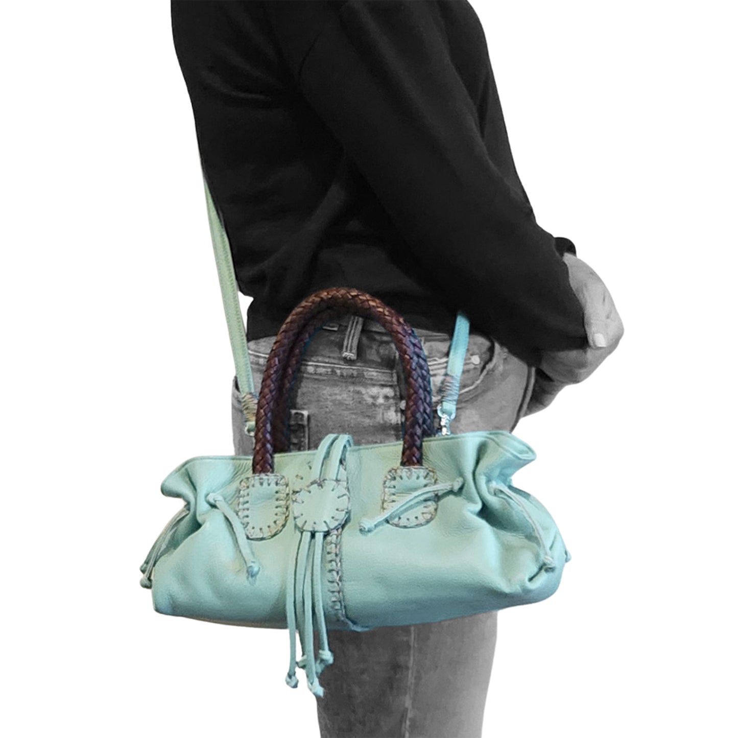 Mini Satchel interior showing tan fabric lining and metal zipper pull with embossed logo detail