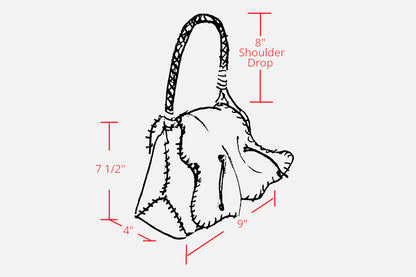 Close-up of the Jumper Maybach's Shoulder Butterfly Bag’s textured beige leather surface, highlighting delicate butterfly