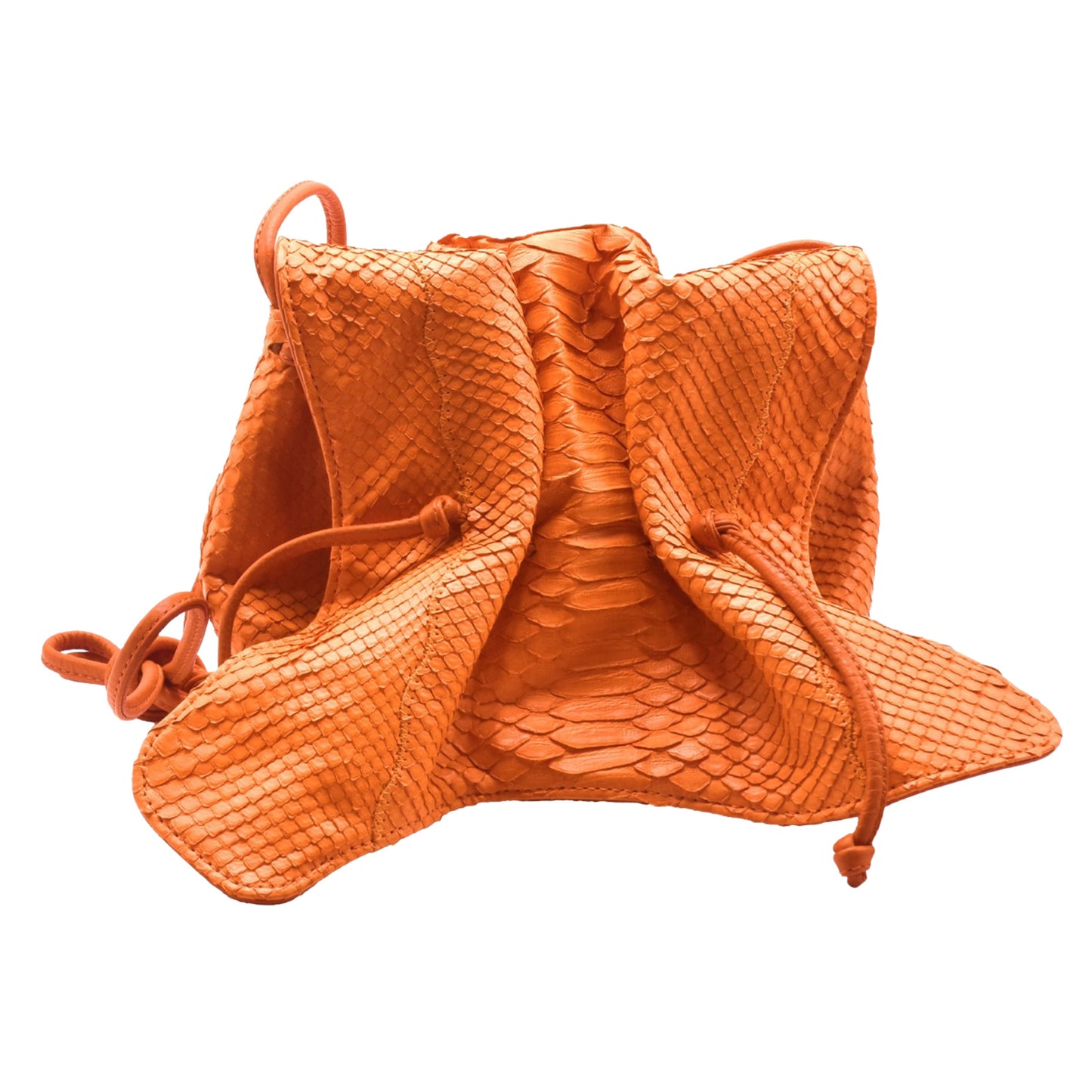 Close-up of textured python skin with embossed butterfly logo on front flap, highlighting intricate scale pattern and rich