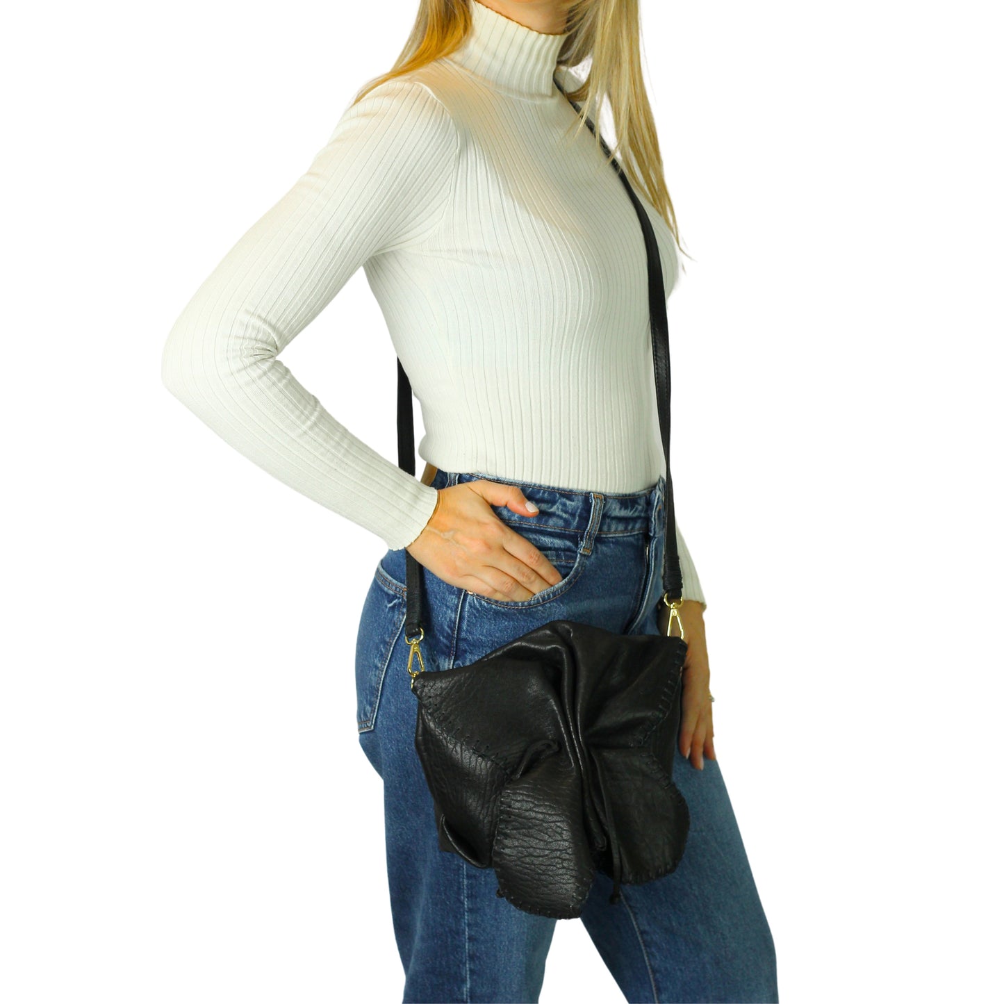 Close-up of the lambskin Butterfly Bag’s textured surface showcasing fine grain detail and matte finish from a front angle.