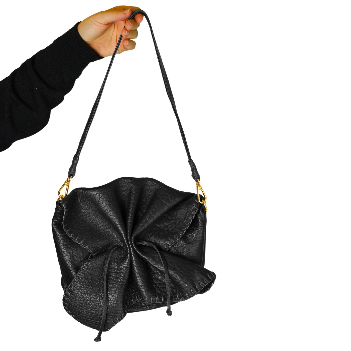 Close-up of the Butterfly Bag Lambskin’s textured leather surface highlighting intricate grain details and fine stitching