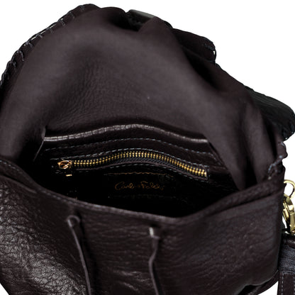 Close-up of the Butterly Bag Lambskin’s smooth, supple surface showcasing fine grain detail and exquisite stitching along