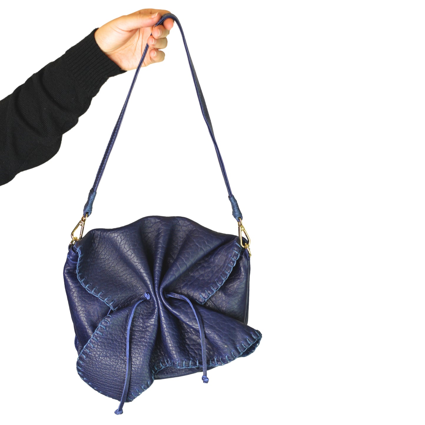 Close-up of the Butterfly Bag Lambskin's textured surface and subtle stitching detail from a diagonal angle.