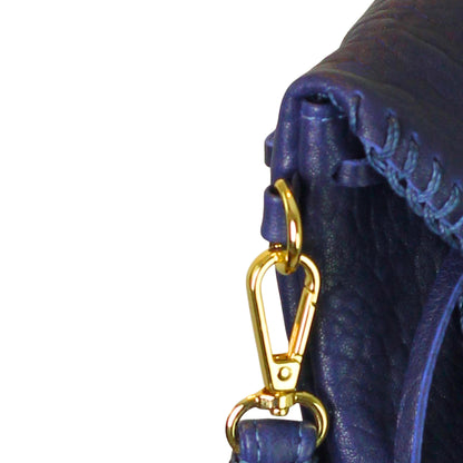 Close-up of the Butterfly Bag Lambskin's textured leather surface with subtle natural grain details and a glimpse of the
