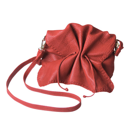 Close-up of the Butterfly Bag Lambskin’s textured leather surface highlighting fine grain and intricate stitching detail