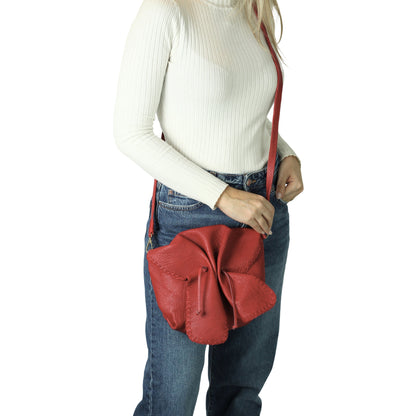 Close-up of the butterfly-shaped lambskin texture highlighting soft, supple surface with subtle natural grain details.