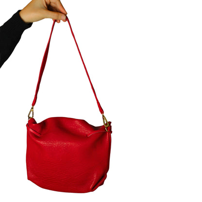 Close-up of the Butterfly Bag Lambskin's supple, textured leather surface highlighting fine grain detail from a top-down