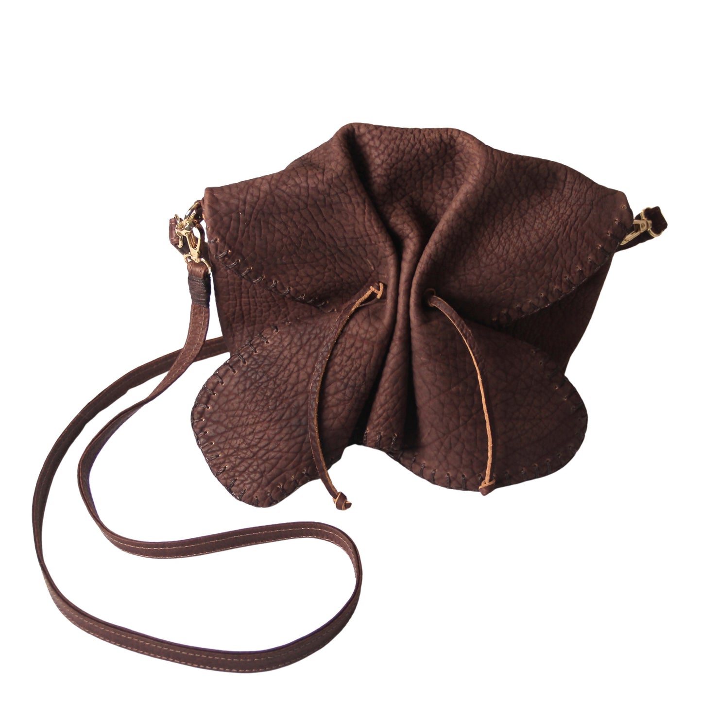 Close-up of the Butterfly Bag Lambskin's textured leather surface revealing soft, natural grain and refined stitching