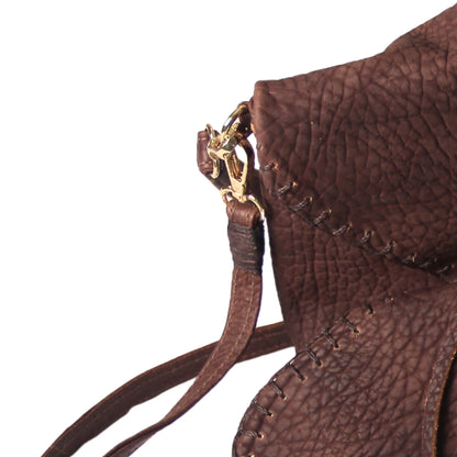 Close-up of the Butterfly Bag Lambskin's textured surface and subtle stitching detail on the side panel