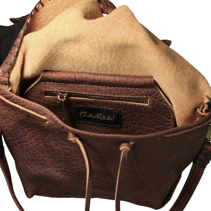 Close-up of the Butterfly Bag Lambskin's finely stitched edge detail highlighting soft, luxurious texture and craftsmanship.