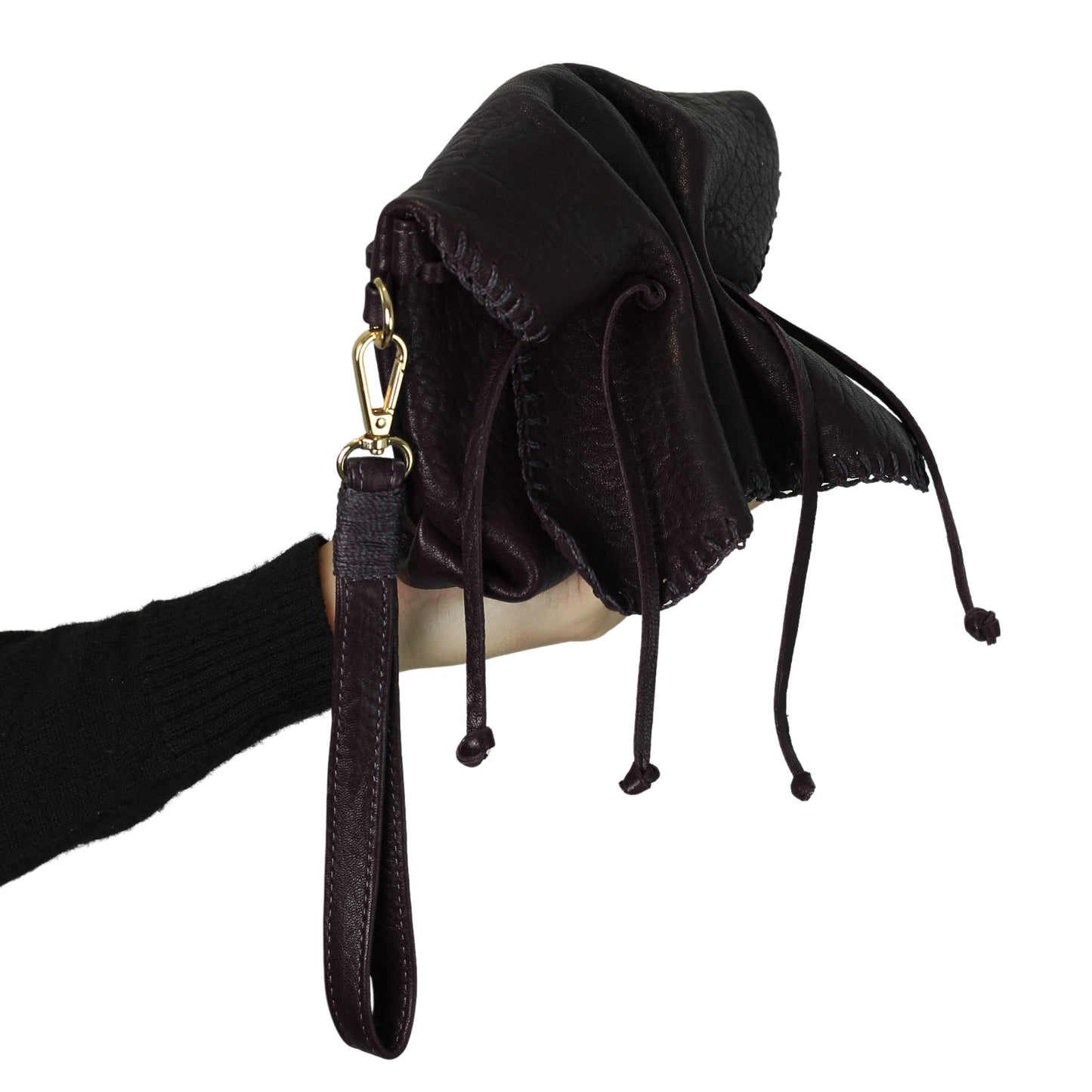 Close-up of the Mini Butterfly Bag’s soft lambskin texture with intricate stitching and delicate butterfly embossed detail