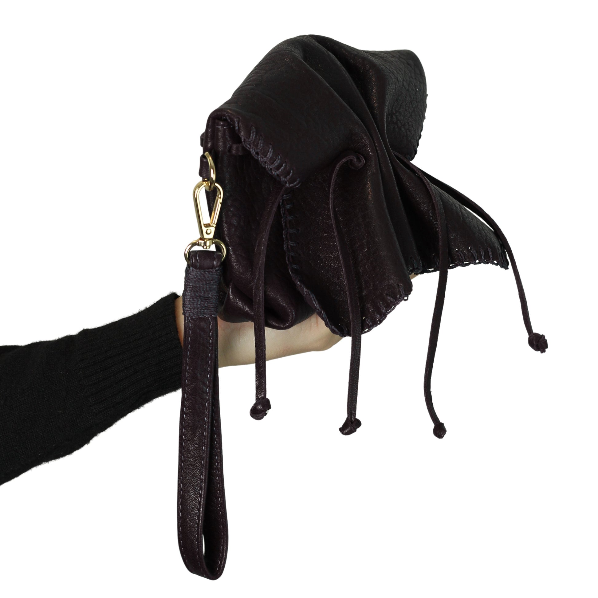 Close-up of the Mini Butterfly Bag’s soft lambskin texture with intricate stitching and delicate butterfly embossed detail