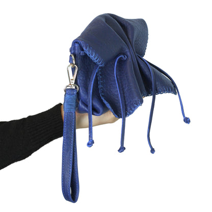 Close-up of the Mini Butterfly Bag lambskin's delicate textured surface and subtle butterfly embossed detail from a front