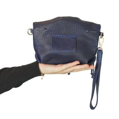 Close-up of the Mini Butterfly Bag's textured lambskin surface highlighting delicate butterfly embroidery and fine stitching