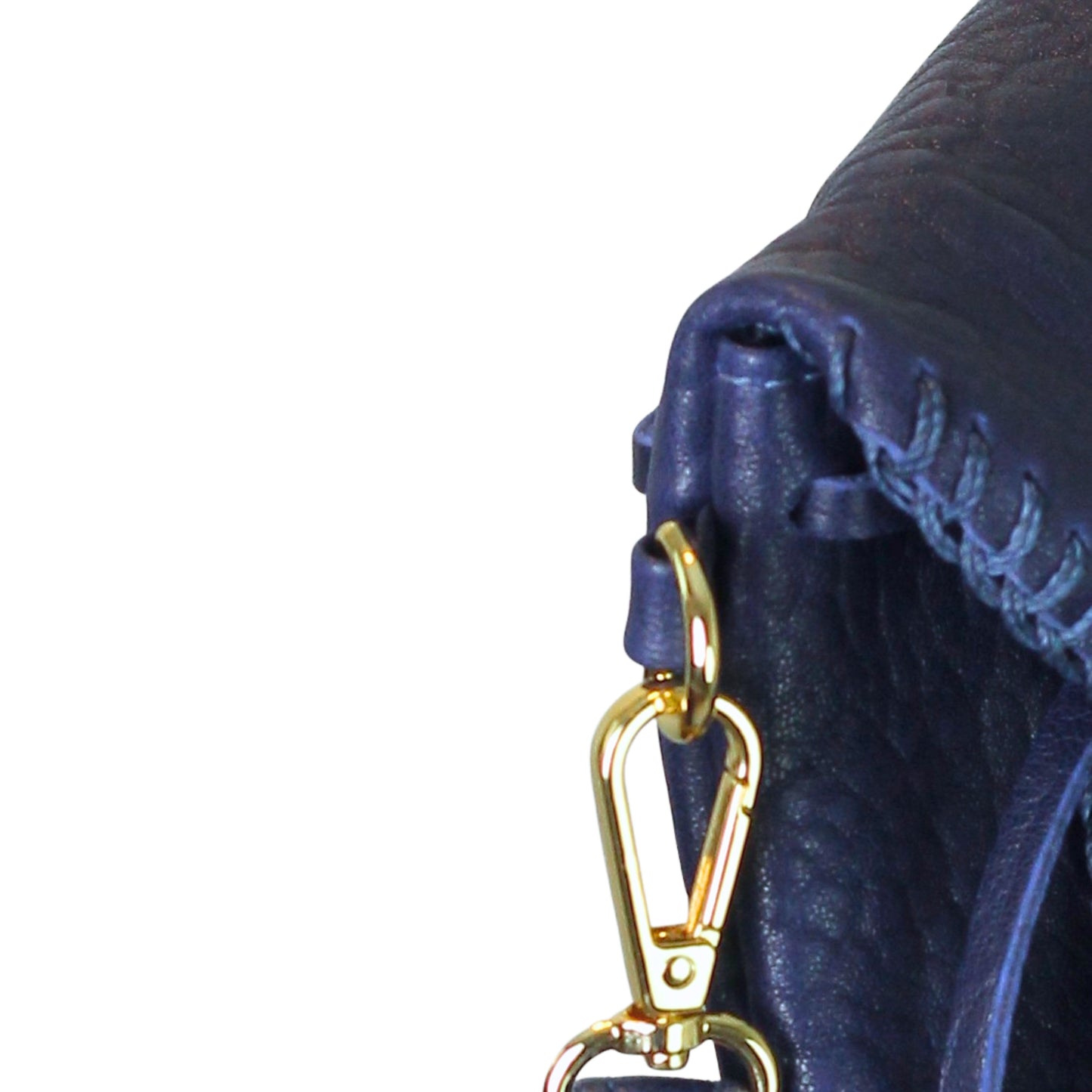 Close-up of the Mini Butterfly Bag’s smooth lambskin surface with delicate stitching detail and subtle sheen from an angled