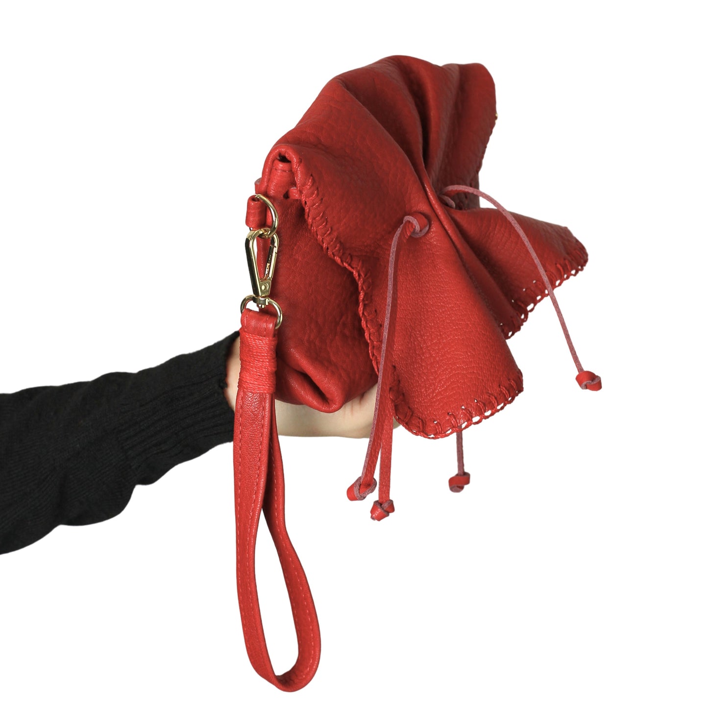 Close-up of the Mini Butterfly Bag’s textured lambskin surface with delicately stitched edges and subtle color variations.