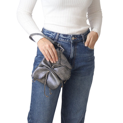 Close-up of the Mini Butterfly Bag’s soft lambskin texture with delicate stitching detail from a top-down perspective.