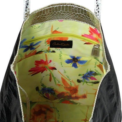 Close-up of the vegan Python Tote’s textured black cotton canvas handle with visible stitching detail and subtle woven