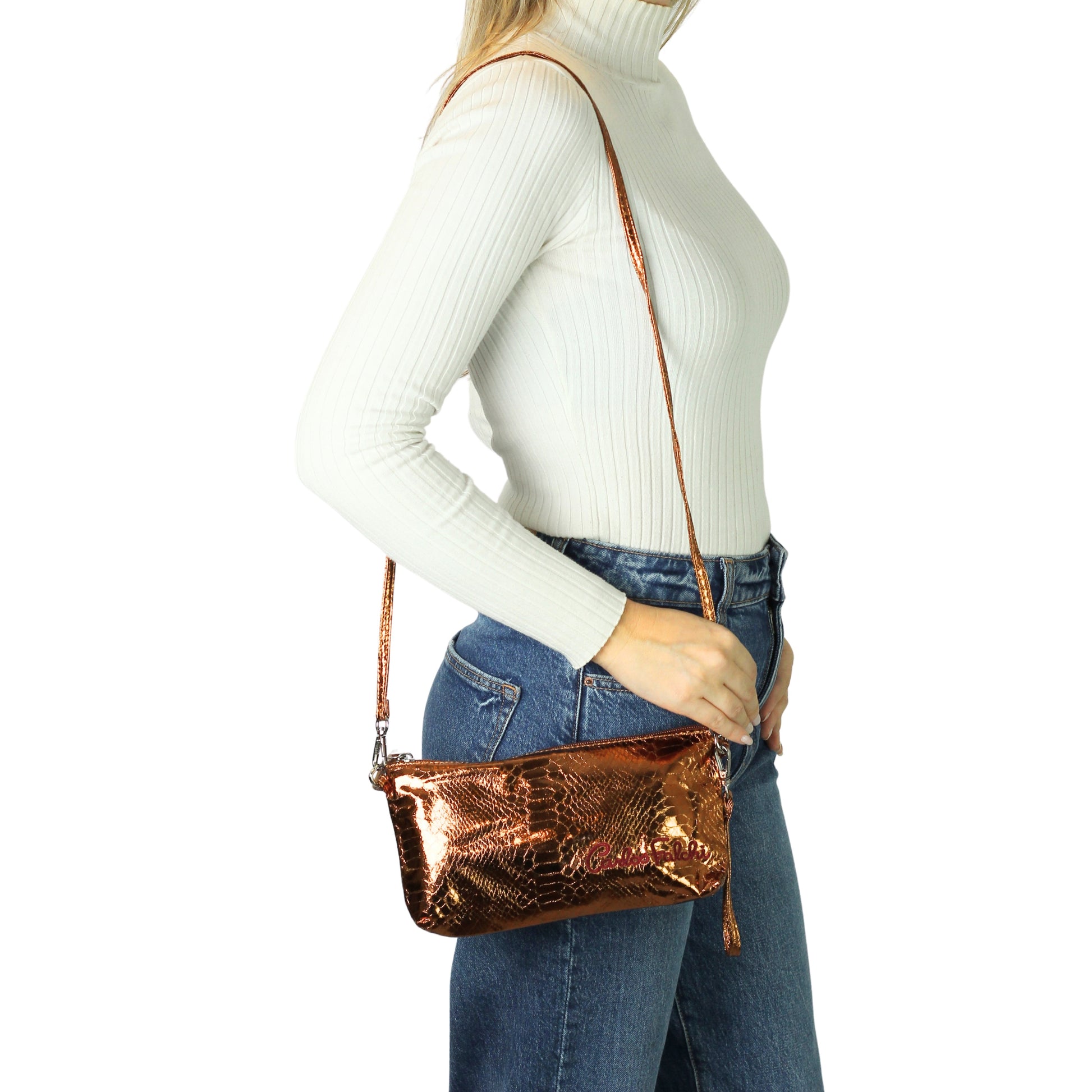 Close-up of the Vegan Python Tote’s textured bamboo handles contrasting with smooth, eco-friendly recycled fabric body at an