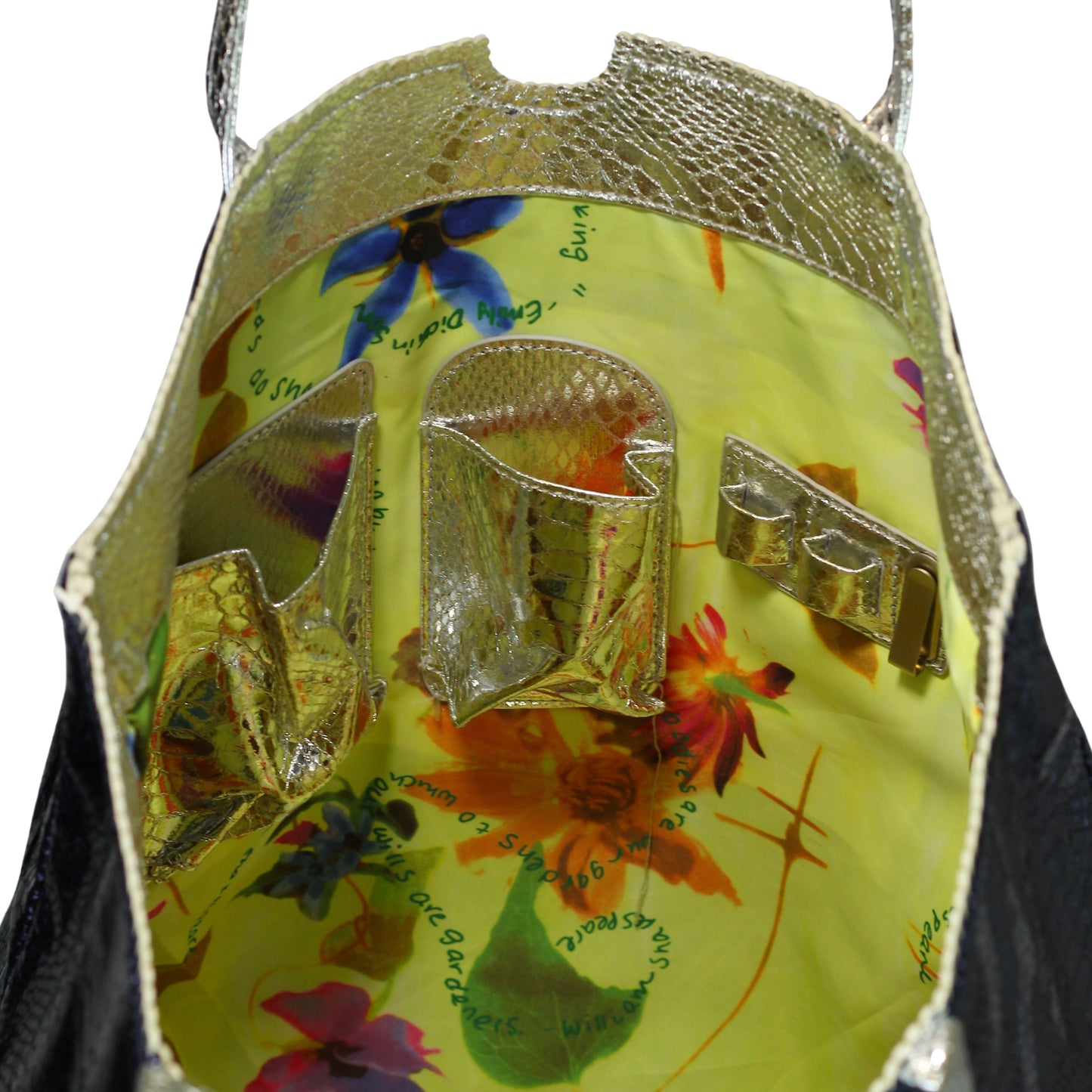 Close-up of vegan Python Tote’s textured woven fabric handle with subtle green stitching detail from an over-the-shoulder