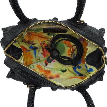 Close-up of the Mini Barrel’s textured oak wood surface with visible grain and aged brass hoops from an angled top-down