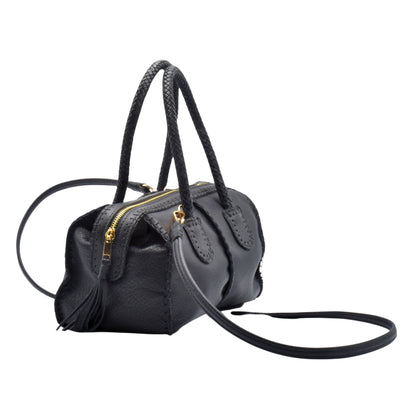 Close-up of the Mini Barrel’s textured oak wood surface and hand-forged metal band detailing showcasing craftsmanship.