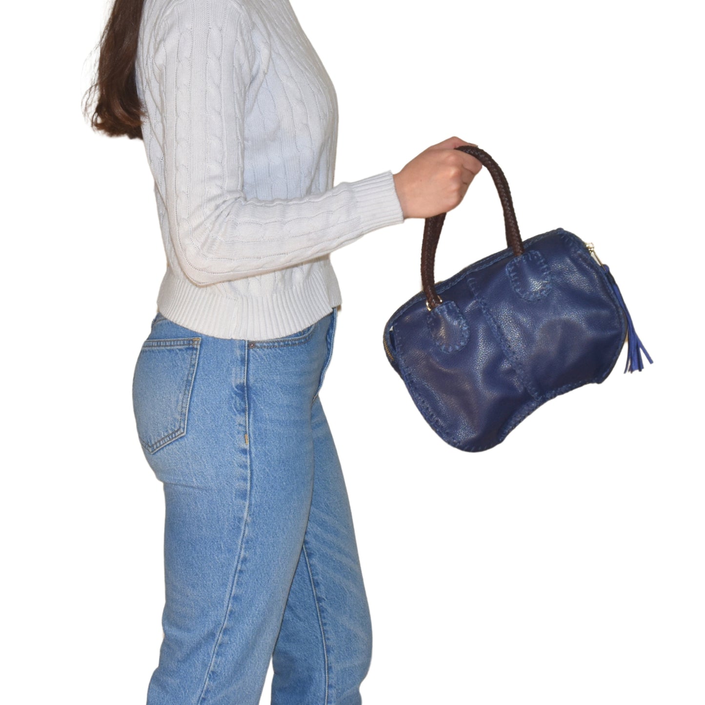 Close-up of the Mini Barrel's textured oak surface with visible metal band and polished wood finish from a top-down angle.