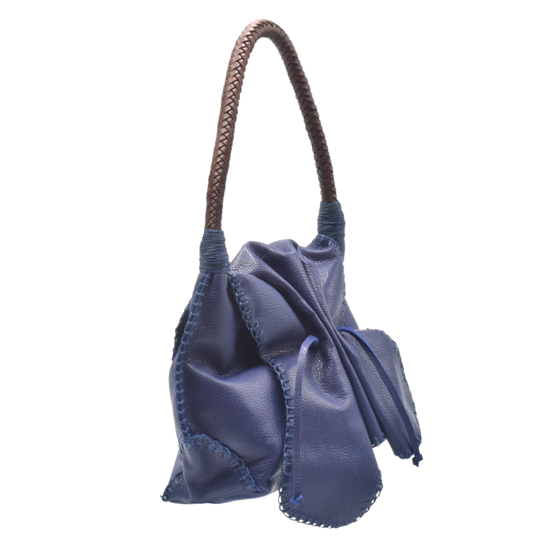 Close-up of the shoulder strap attachment with reinforced stitching and metallic hardware detail on the Butterfly Bag.