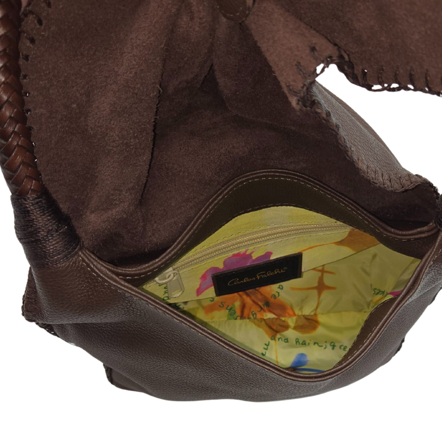 Close-up of the Shoulder Butterfly Bag’s textured faux leather surface and gold-tone zipper pull detail from a slightly