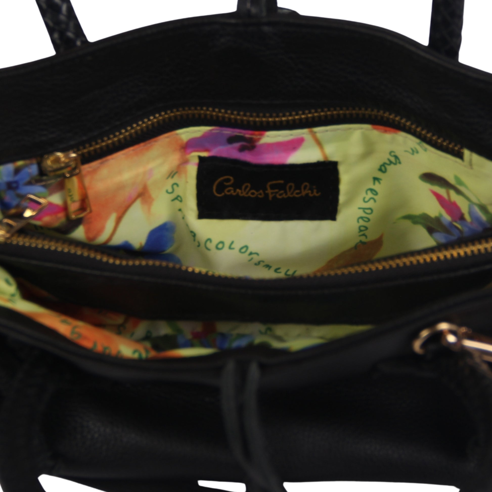 Mini Satchel showcasing textured pebble leather handle detail and gold-tone zipper closure from a slightly angled overhead