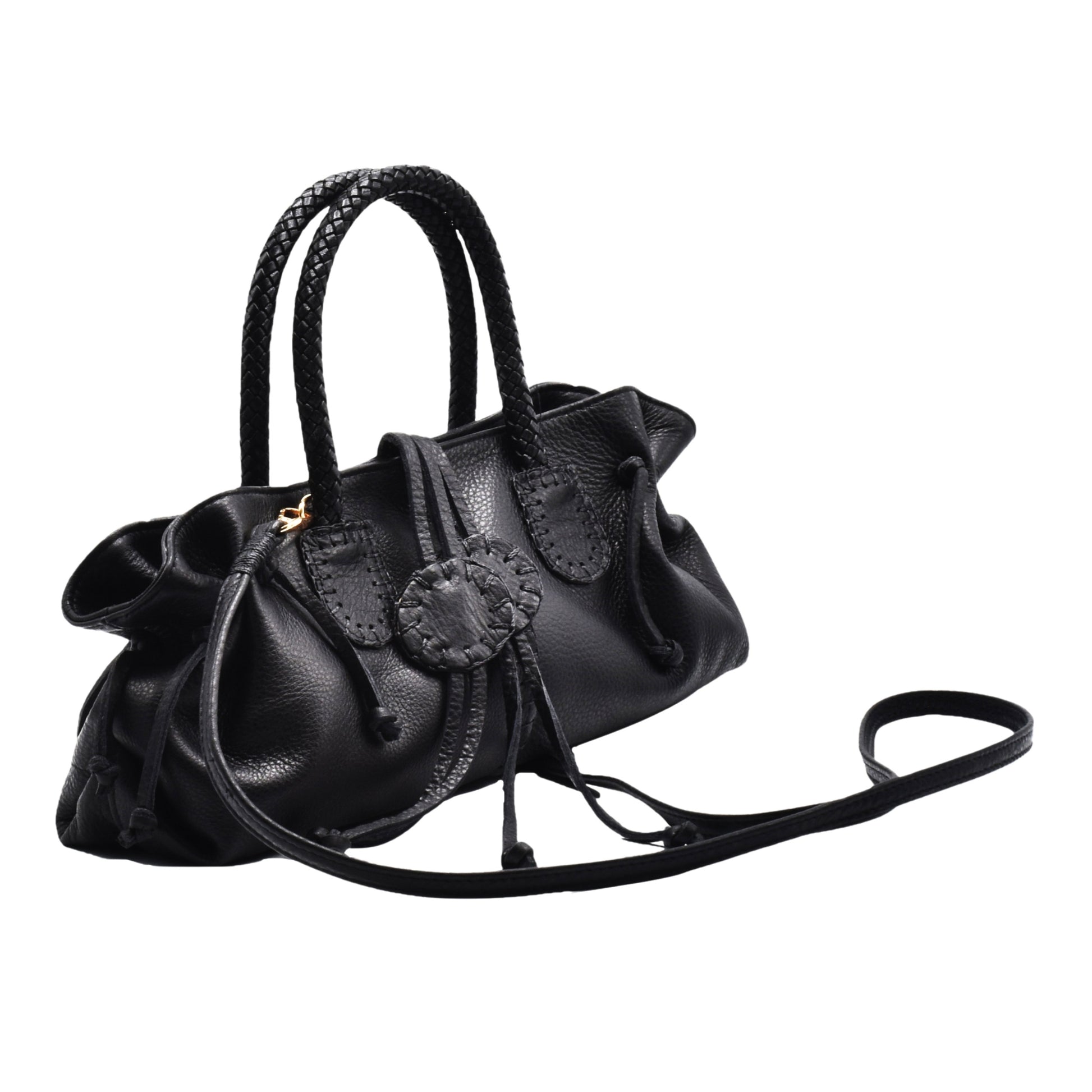 Close-up of the mini satchel’s textured leather surface with silver zipper pull and subtle embossed logo detail.