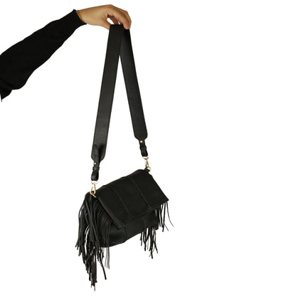 Close-up of the Large Fringe Crossbody Messenger’s gold-tone chain strap with layered tassel details and intricate metalwork