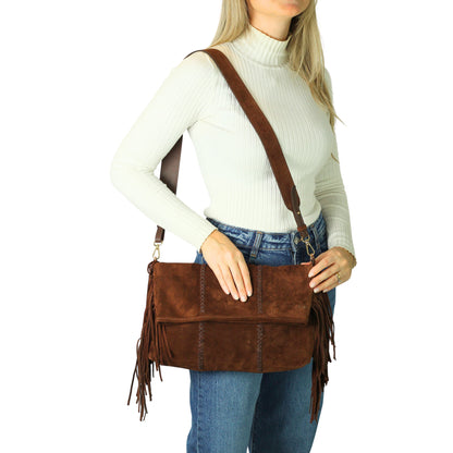 Close-up of the Large Fringe Crossbody Messenger’s textured metal chain and detailed fringe tassels from a diagonal angle.